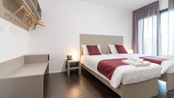 Premium bedding, down comforters, Select Comfort beds, minibar