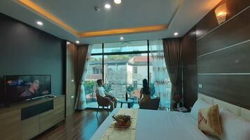 Down comforters, minibar, blackout drapes, iron/ironing board