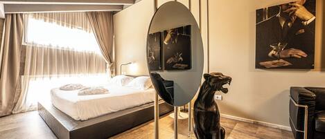 Deluxe Suite, 1 Queen Bed | Premium bedding, minibar, in-room safe, individually decorated