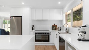 Microwave, stovetop, dishwasher, coffee/tea maker