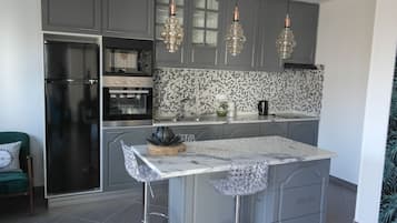 Appartement Deluxe, 2 chambres (Conforto) | Cuisine privée | CafetiÚre/bouilloire, bouilloire électrique