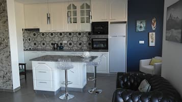 Apartment, 2 Bedrooms (Sossego) | Private kitchen | Coffee/tea maker, electric kettle