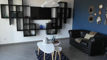 Apartment, 2 Bedrooms (Sossego) | Living room | Smart TV, pay movies