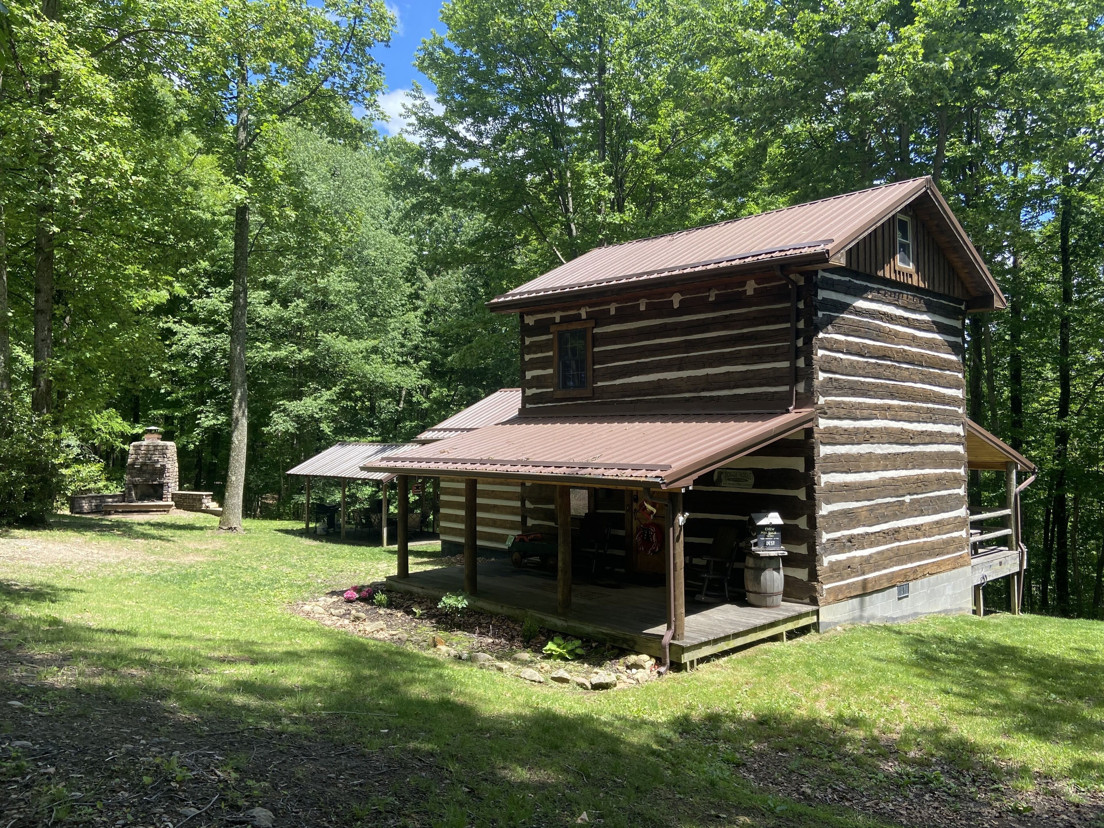 Indian Camp Retreat....with relaxing Hot tub, outdoor Fireplace and Pavillion!