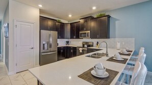 House | Private kitchen - Alluring 8bed 5bath Pool Villa at Champions Gate (Davenport)