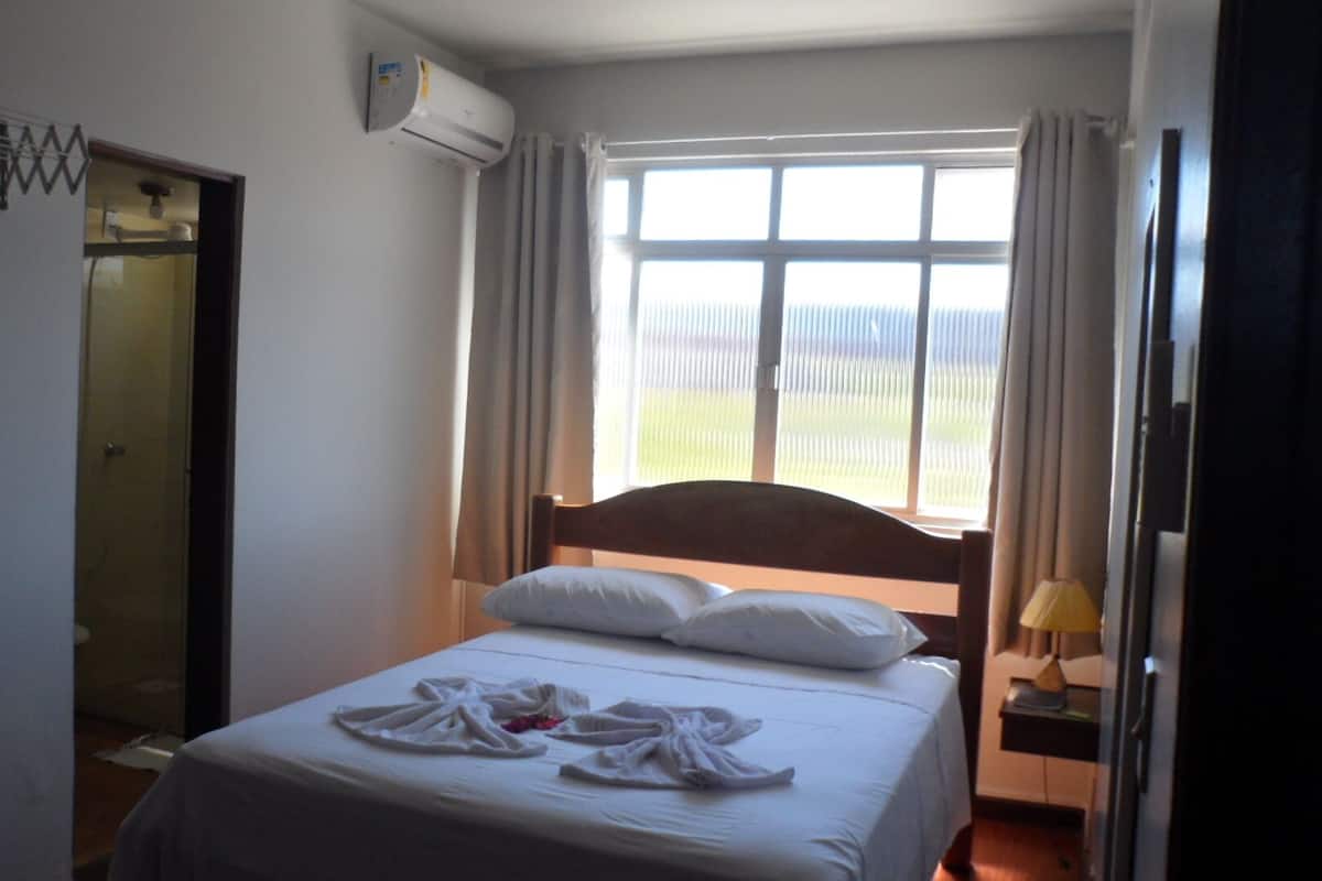 Apartamento estándar, cocina, vistas a la ciudad | 1 dormitorio, caja fuerte, wifi gratis y ropa de cama