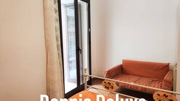 Deluxe-Doppelzimmer, Balkon, Stadtblick | Schallisolierte Zimmer, kostenloses WLAN, Bettwäsche