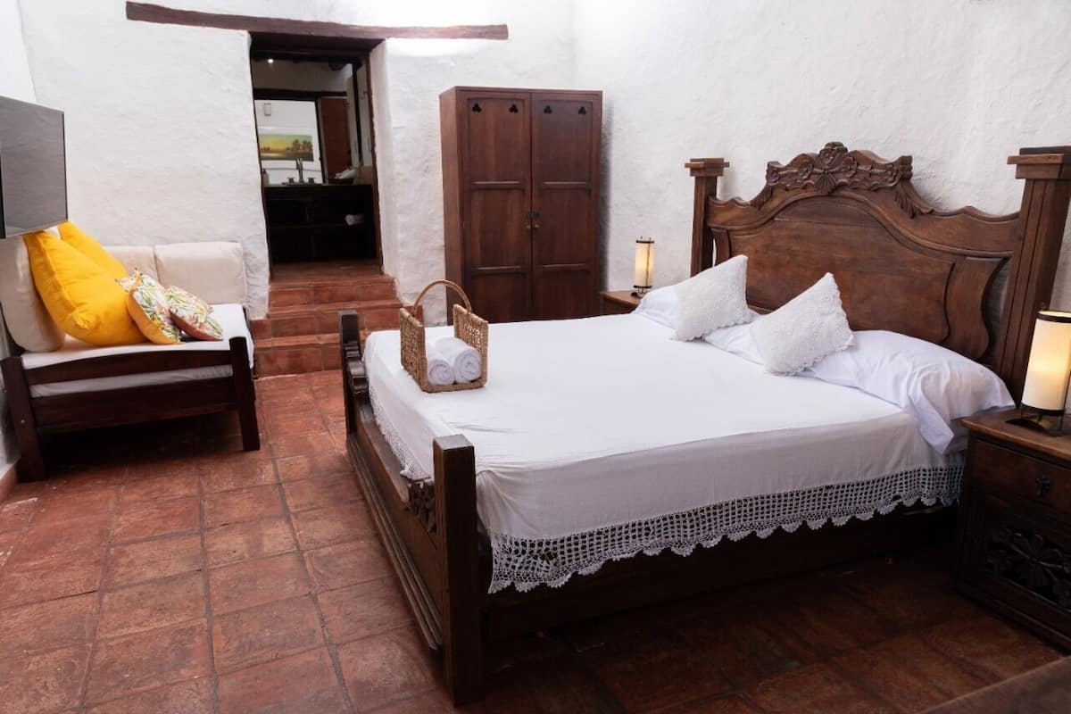 Premium bedding, desk, laptop workspace, soundproofing