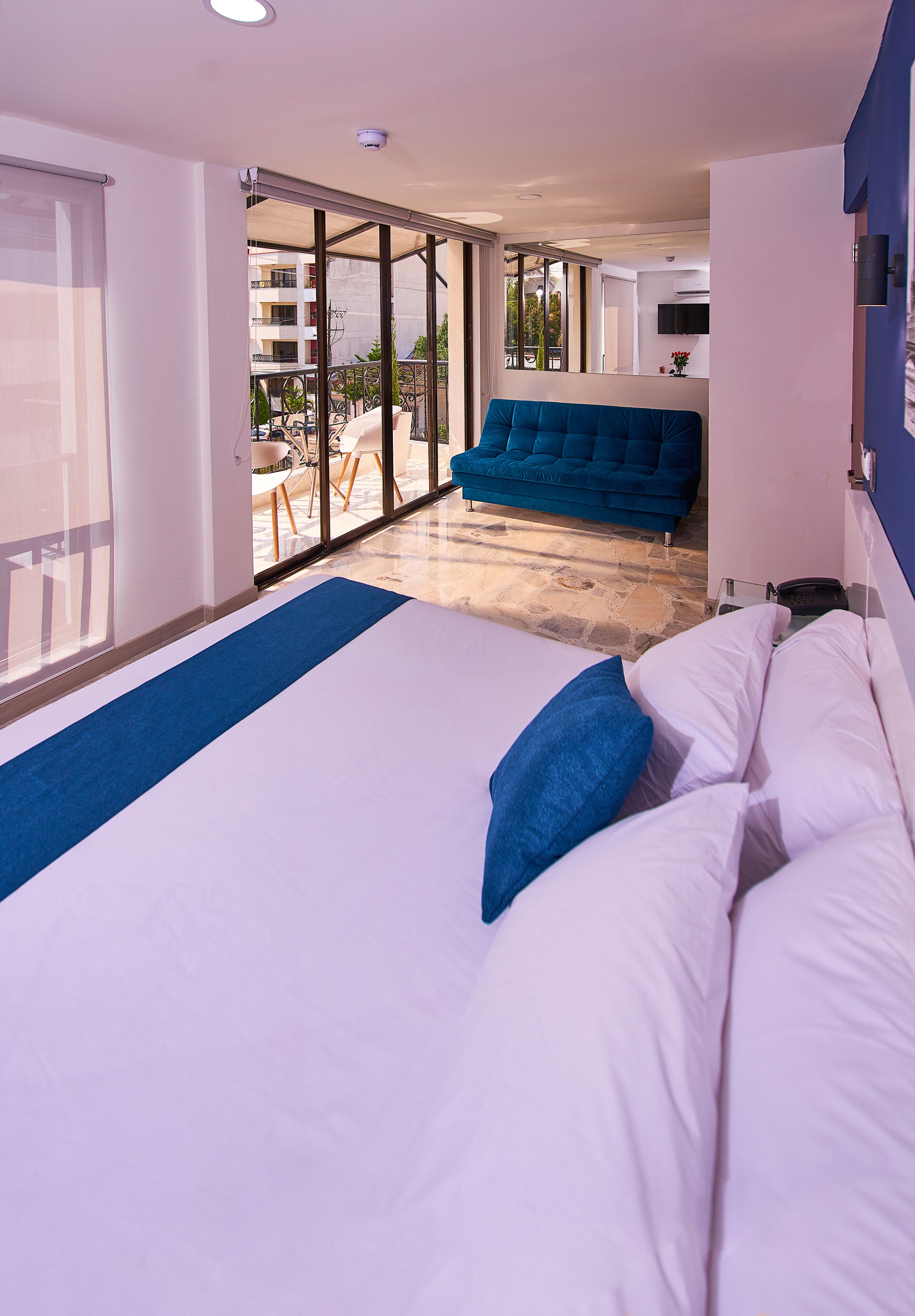 elite triple room | premium bedding, down duvets, select comfort beds, desk