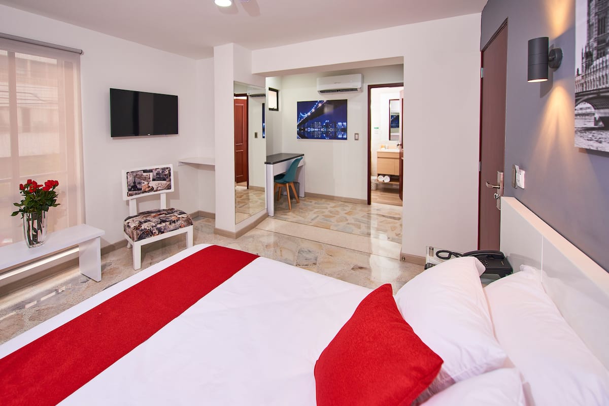 deluxe double room | premium bedding, down duvets, select comfort beds, desk