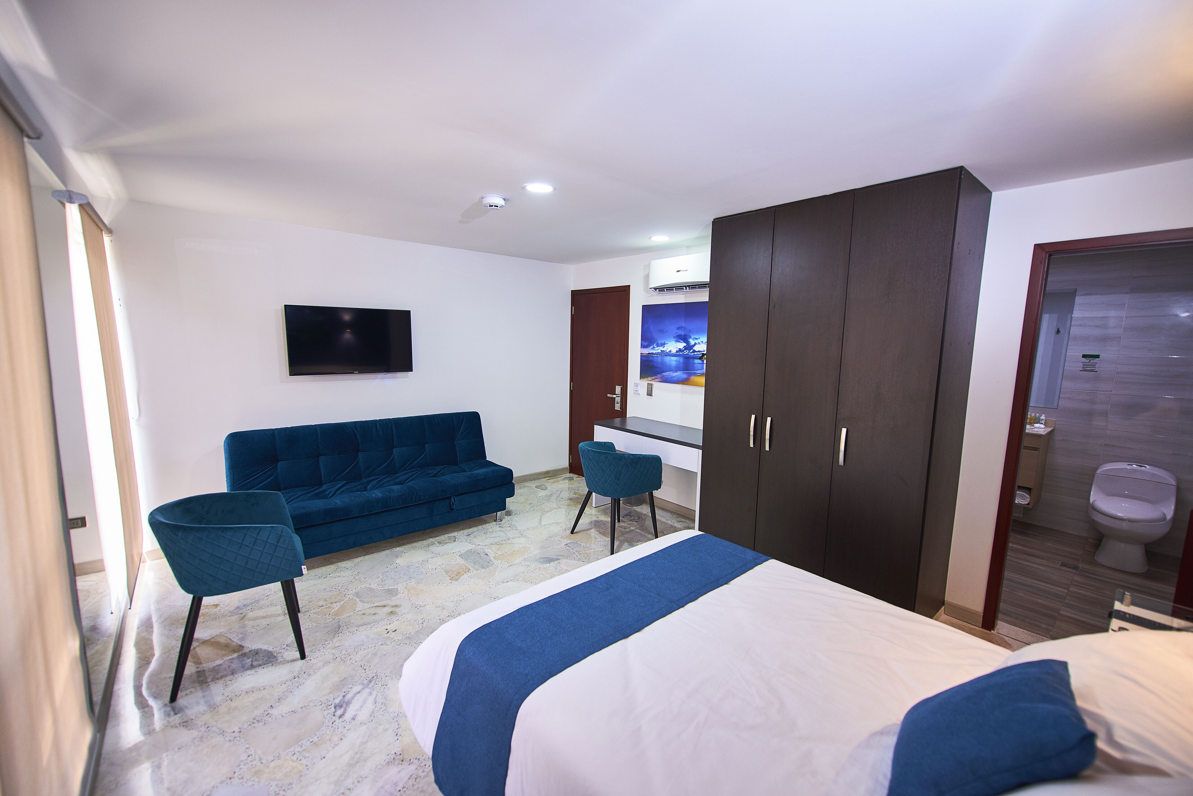 superior triple room | premium bedding, down duvets, select comfort beds, desk