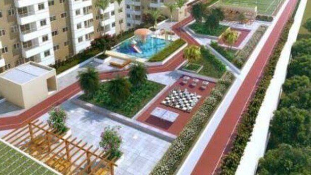 A residential complex with multiple high-rise buildings, a central courtyard with a swimming pool, and a running track. - Apartment next to the Grêmio Arena (Farrapos)