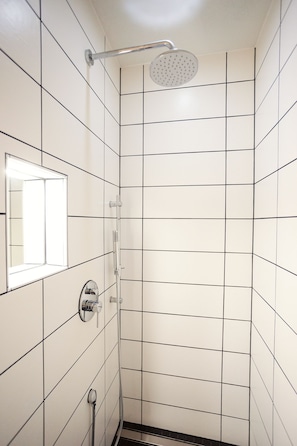Shower, hair dryer, towels, toilet paper