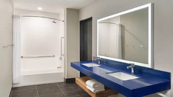 Designer toiletries, hair dryer, towels, soap