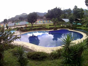 Outdoor pool, pool umbrellas, pool loungers