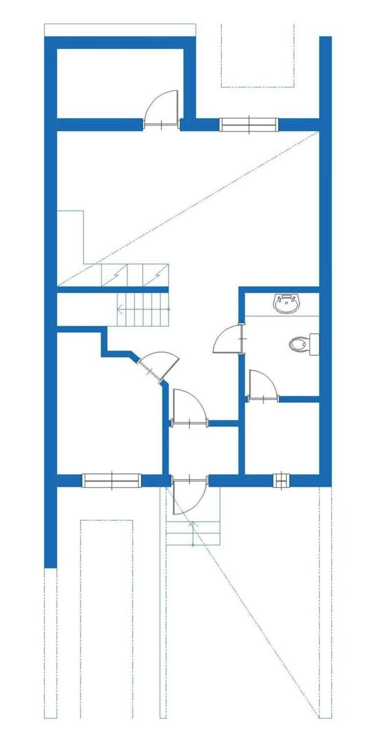 A floor plan with a kitchen, dining area, and two bedrooms.