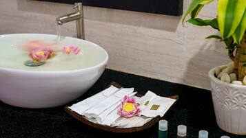 Hair dryer, towels, shampoo, toilet paper