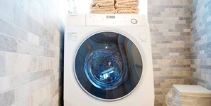 Standard Family Room 201 | Bathroom amenities | Separate tub and shower, free toiletries, hair dryer, slippers - Mcity in Furujima (Naha)