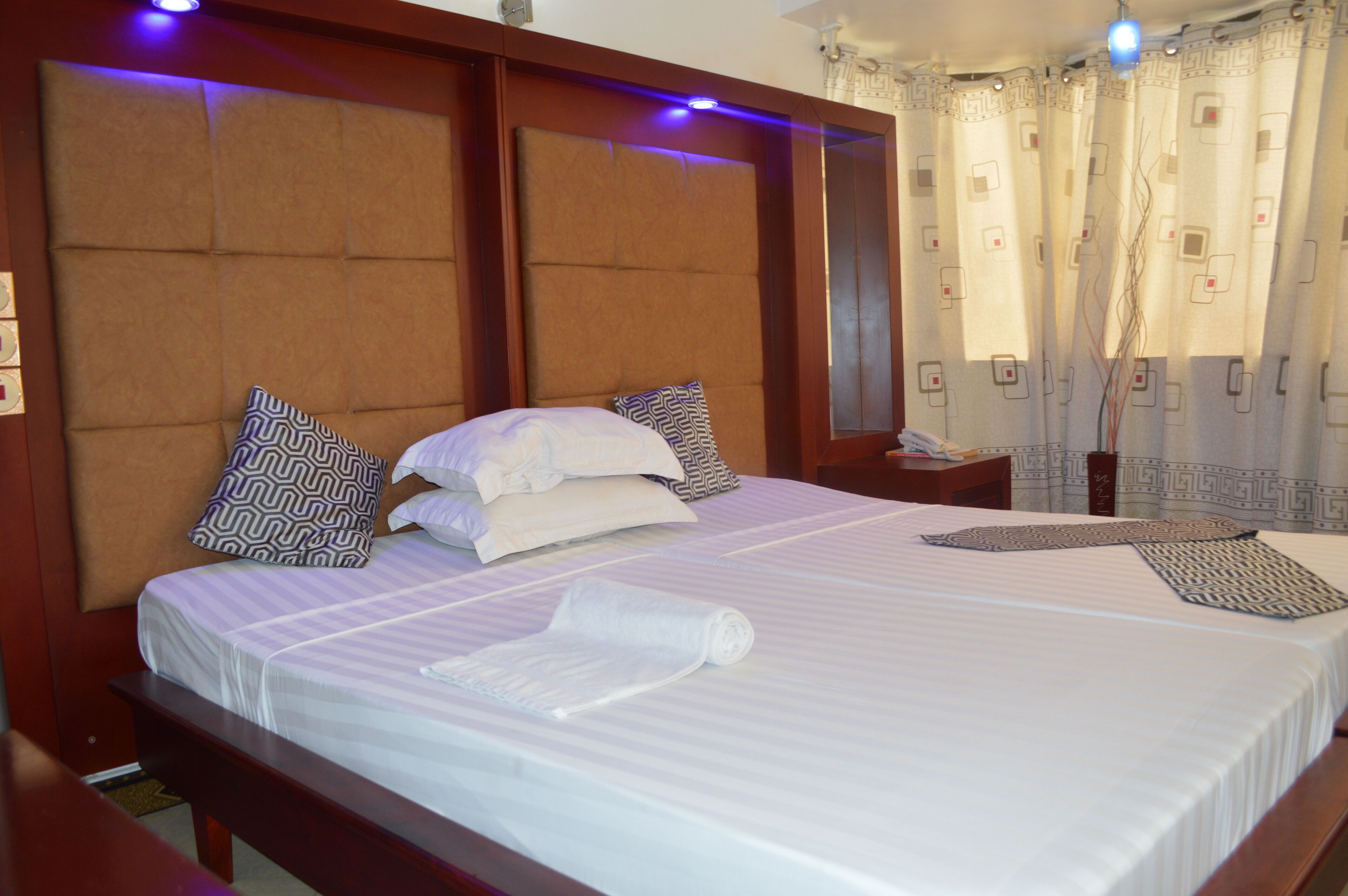 in-room safe, desk, blackout curtains, iron/ironing board