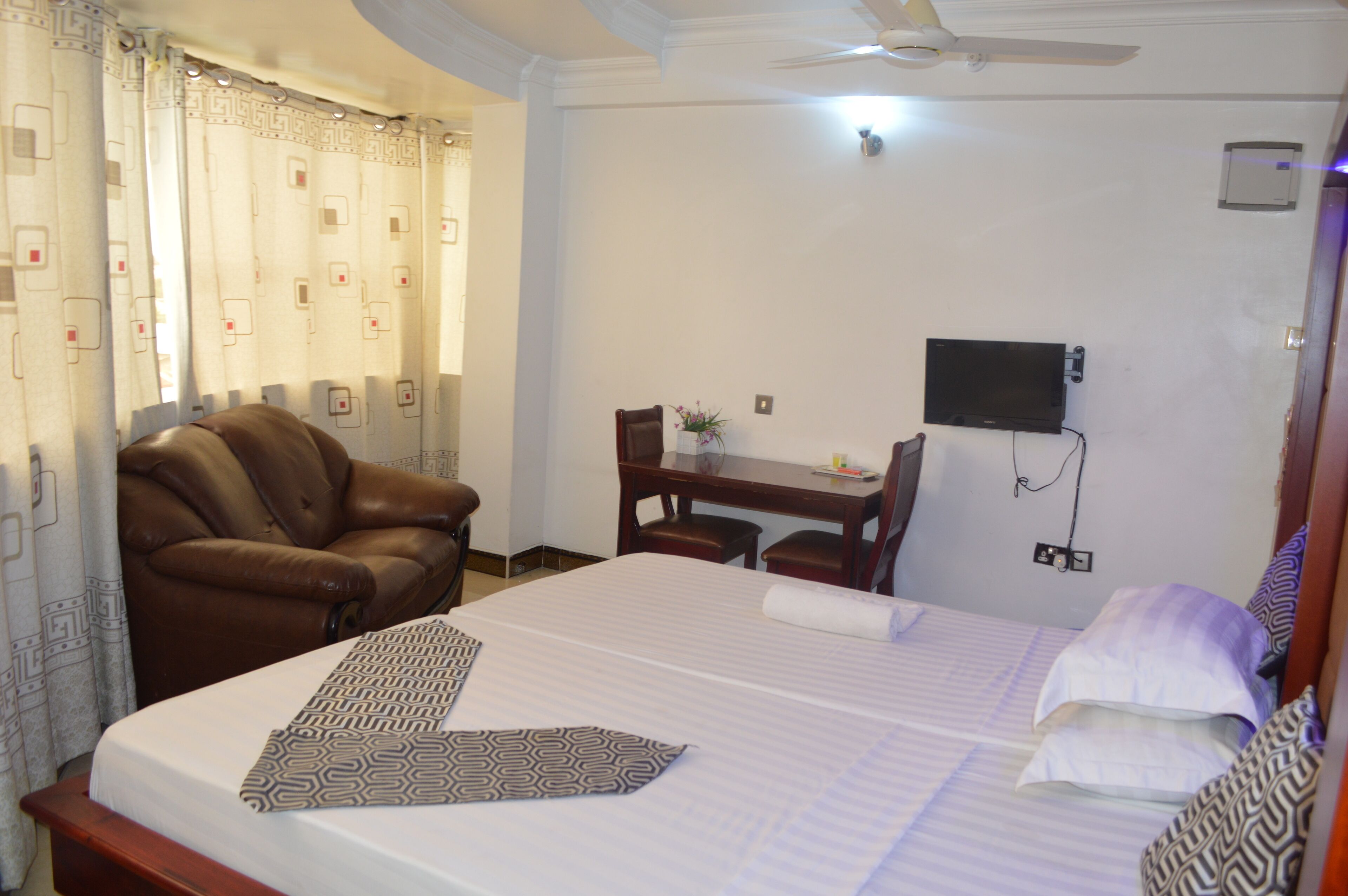 in-room safe, desk, blackout curtains, iron/ironing board