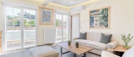 Apartamento, 2 quartos | Área de estar | TV de tela plana, Netflix, serviços de streaming