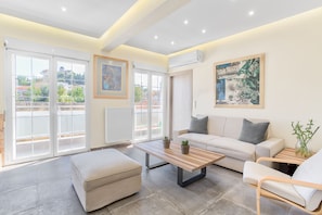 Apartamento, 2 quartos | Área de estar | TV de tela plana, Netflix, serviços de streaming