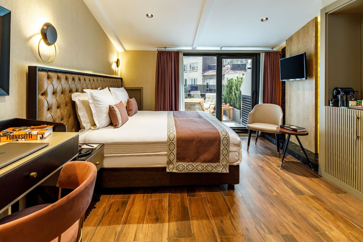 Executive tweepersoonskamer, terras | Een minibar, geluiddichte muren, gratis wifi, beddengoed