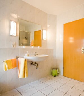 Shower, hair dryer, bathrobes, towels