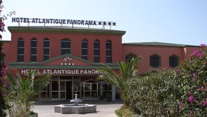 A building with a sign reading "HOTEL ATLANTIQUE PANORAMA." - Atlantique Panorama (Safi)