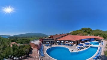 Seasonal outdoor pool, open 9:00 AM to 7:00 PM, pool umbrellas