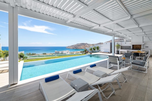 Seasonal outdoor pool, pool loungers