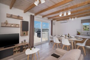 Villa, Private Pool | Living room | Flat-screen TV