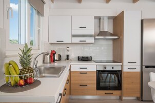 Villa, Private Pool | Private kitchen | Full-size fridge, oven, stovetop, coffee/tea maker