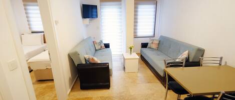 Apartment, 1 Bedroom, City View | Living room | LCD TV