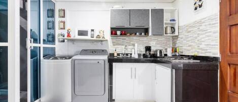 Fridge, microwave, stovetop, coffee/tea maker