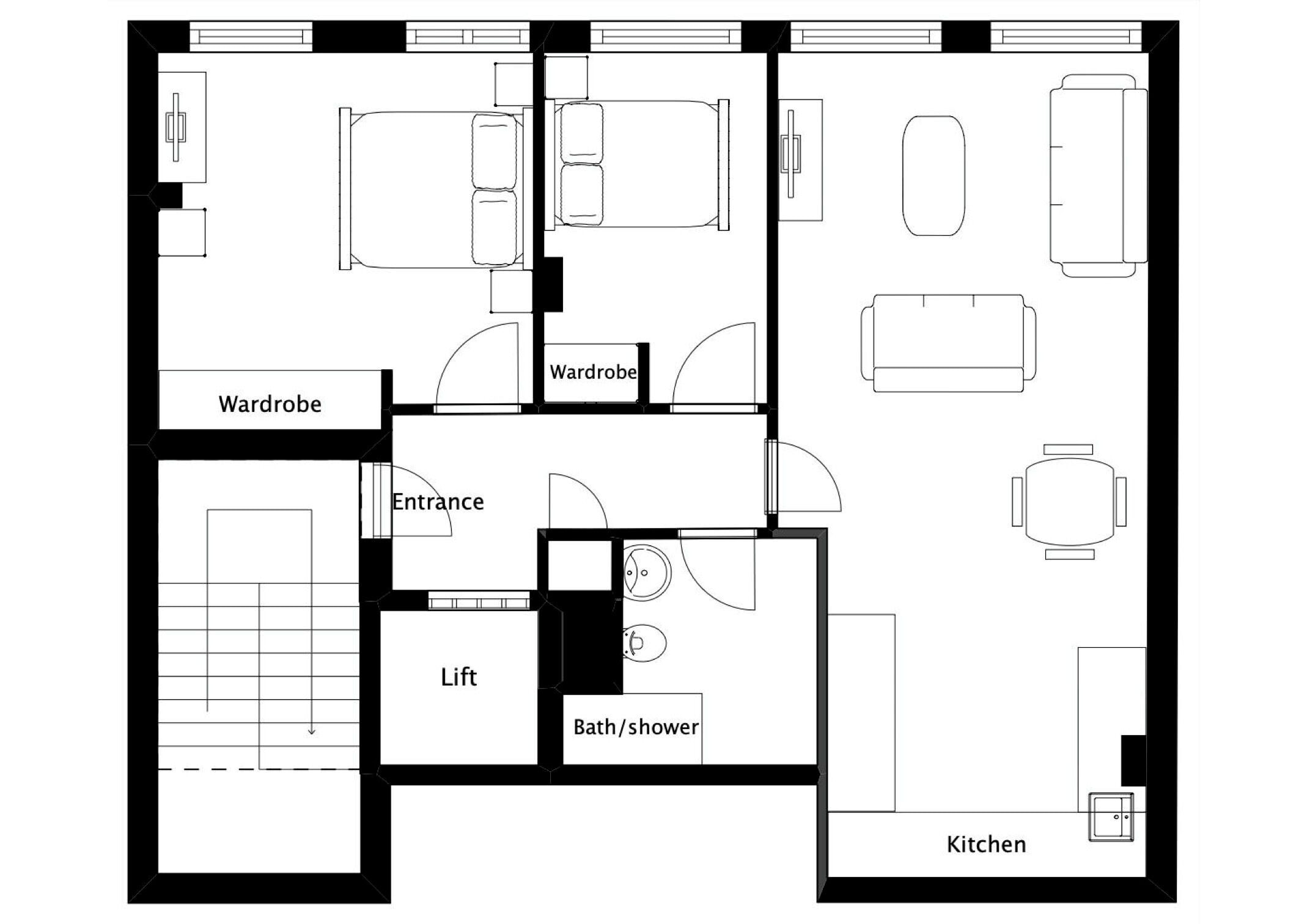 Plano de un hotel que muestra un armario, entrada, ascensor, baño con ducha y cocina.