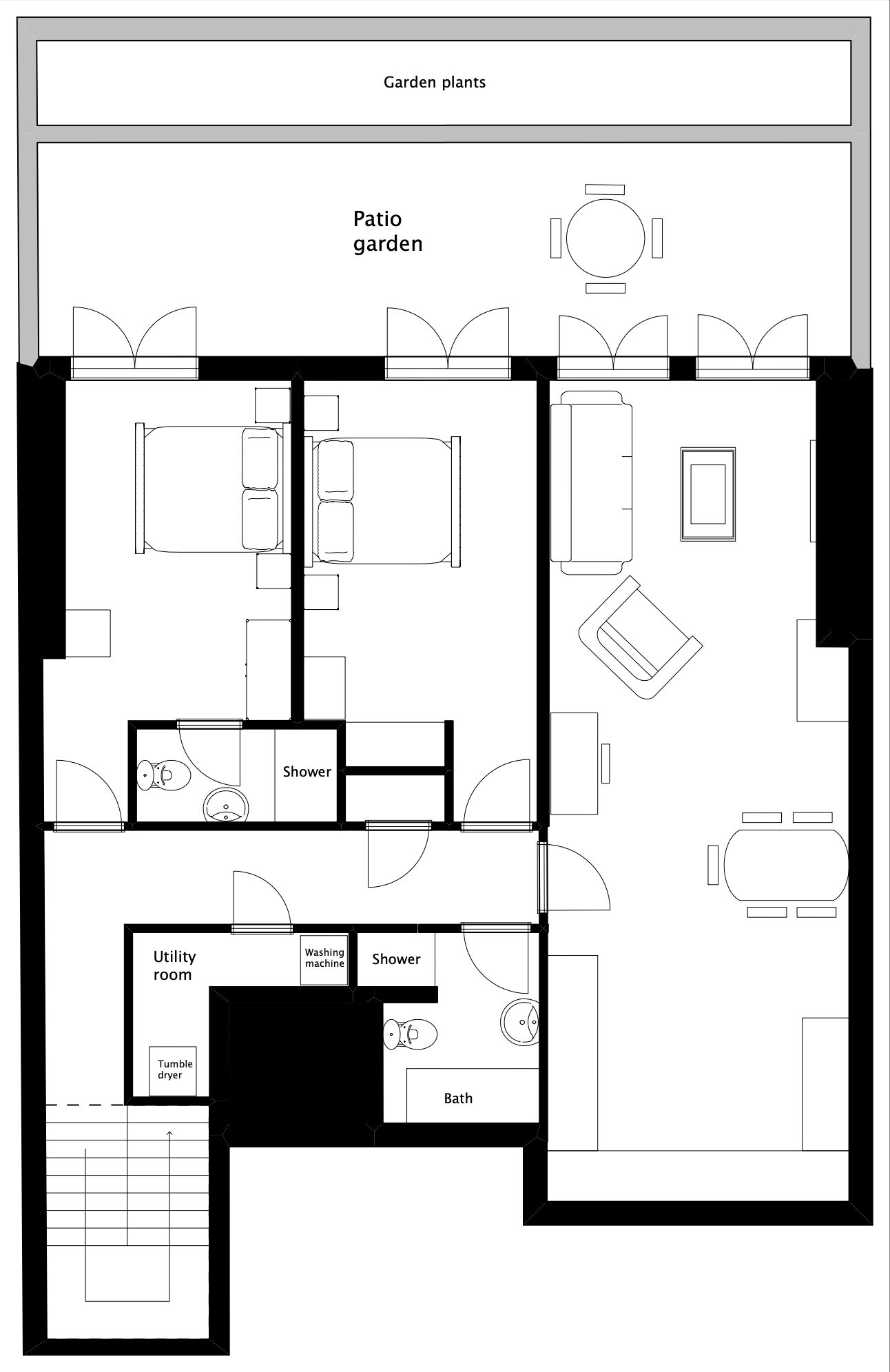 Plano de planta de una casa con jardín en el patio, cuarto de servicio y un baño con secadora.
