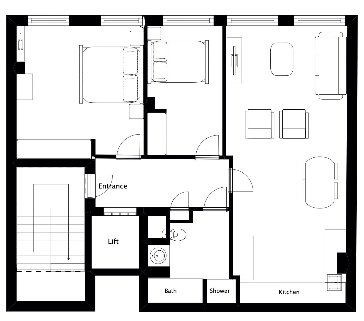 Plano de planta de un hotel que muestra un ascensor, entrada, baño, ducha y cocina.