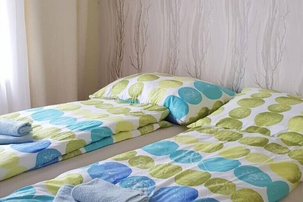 Apartment Grand | Wi-Fi gratis dan seprai linen