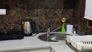 Suite estudio Confort | Cocineta privada