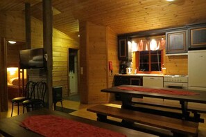 Family Cabin (Cleaning, bed linen & towels excluded) | Living area | TV, table tennis