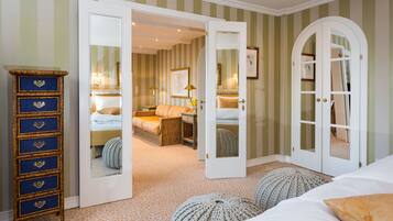 Superior Suite | Living area | Flat-screen TV