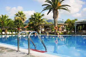 Outdoor pool, open 9:00 AM to 7:00 PM, sun loungers