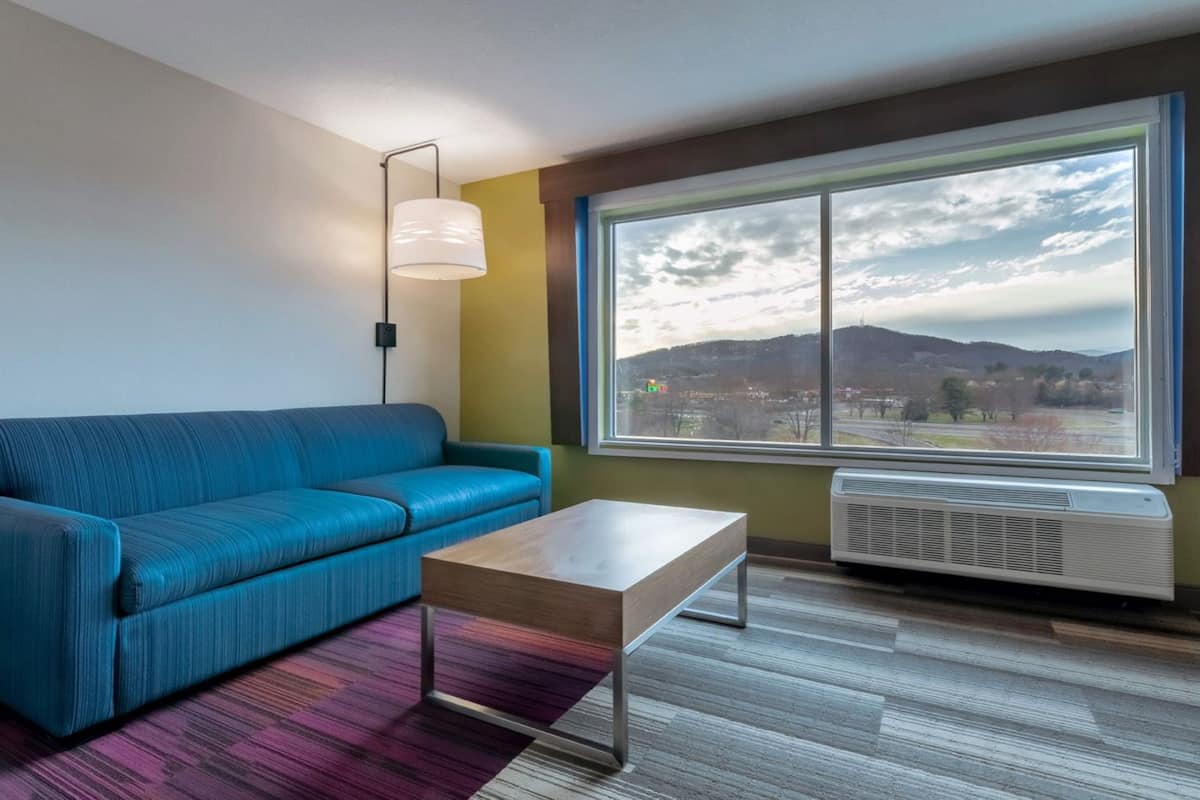 suite, 2 queen beds (additional living area) | in-room safe, desk, laptop workspace, blackout curtains