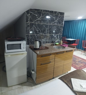 Panoramic Penthouse, Non Smoking, Sea View | Private kitchen | Fridge, microwave, electric kettle, cookware/dishes/utensils - Galaxy Hotel Sultanahmet (Istanbul)