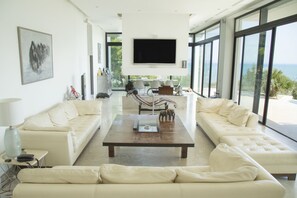Royal Villa, 3 Bedrooms, Sea View | Living room | 42-inch Smart TV with satellite channels, TV, DVD player - The Cliff House (Carthage)