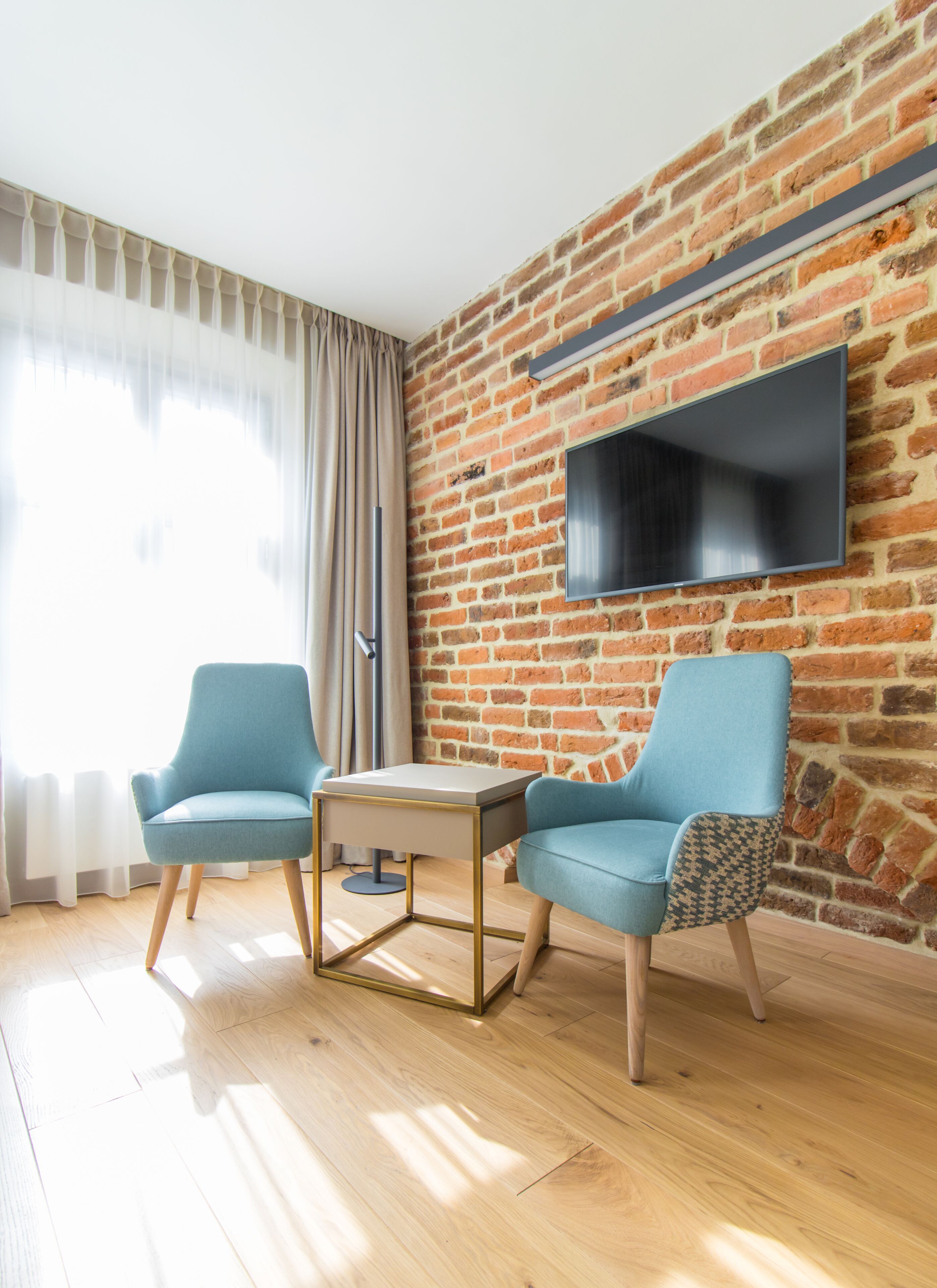 Superior Double Room (Deluxe) | Living area | LCD TV