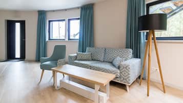 Comfort appartement (Silos) | Woonruimte | Een flatscreentelevisie