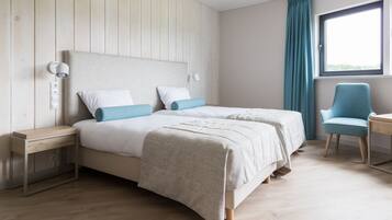 Comfort appartement (Silos) | Woonruimte | Een flatscreentelevisie