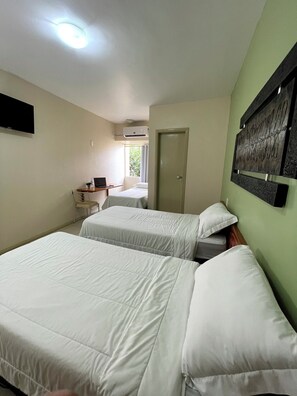 Chambre Triple, 3 lits une place